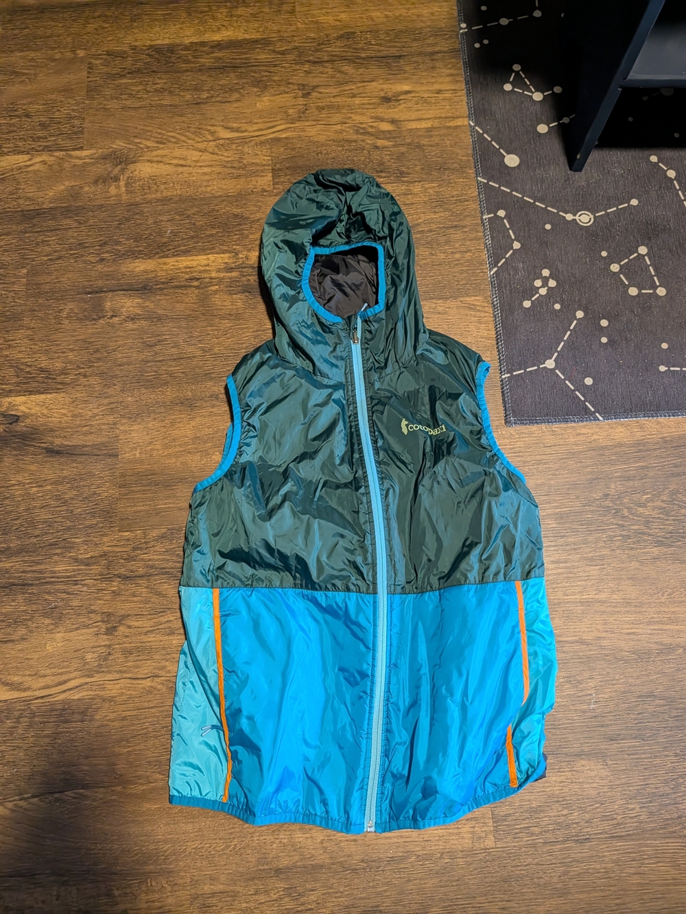 cotopaxi Green and Blue Womens Hooded Vest with Orange Accents